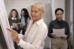 Une cadre participe à un coaching de dirigeants
